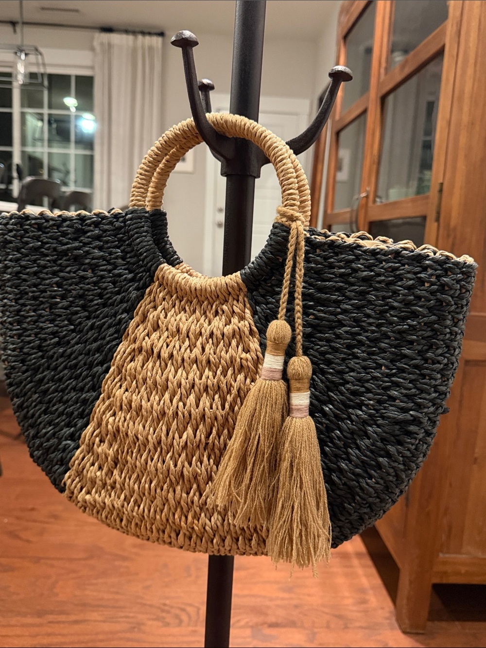 Two-Tone Woven Straw Tote with Tassel Accents - Black & Tan